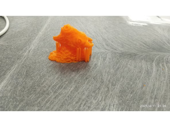 If your part had support material, you may now safely remove it.  Use pliers and exercise caution.