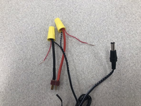 Looking at the diagram on the left, connect your motors to M1 and M2 on your motor shield using the terminal blocks. For help using the terminal blocks refer to this link