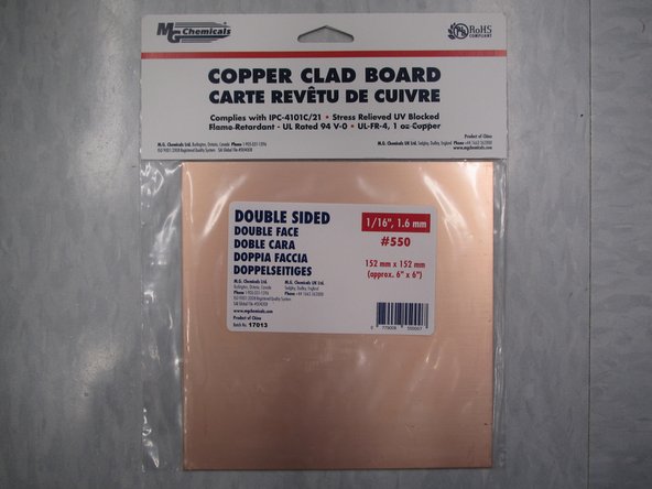 Look for a piece of copper clad with enough room to accommodate your PCB design plus the fiducial holes you added to your design.  Having a 1:1 printout of your PCB (plus fiducials) on paper can aid in identifying whether your design will fit on a piece of copper clad.