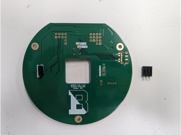 Locate the remaining, taller 3 socket header from your parts kit.