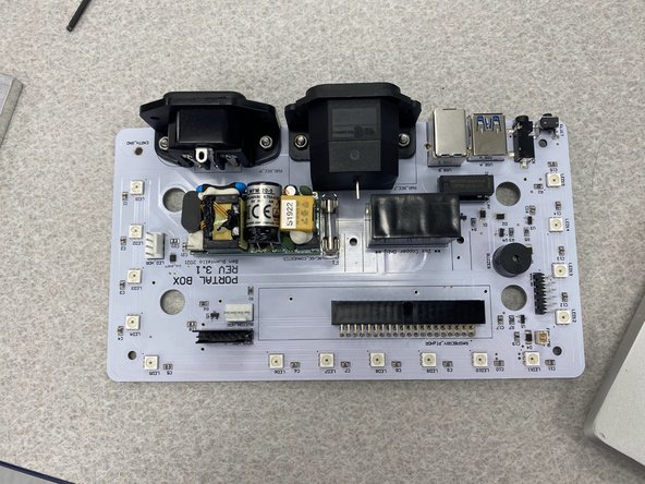 20x2 pin female header for RPi - Solder this first. Because the Pi is tall, the header needs to float a bit. We need to first attach the Pi mount, put the header on the Pi, attach it to the board via the screw holes, and then solder on the header to ensure a proper fit. Once this is done, you can dismount the Pi, leaving the 3D printed bracket on.