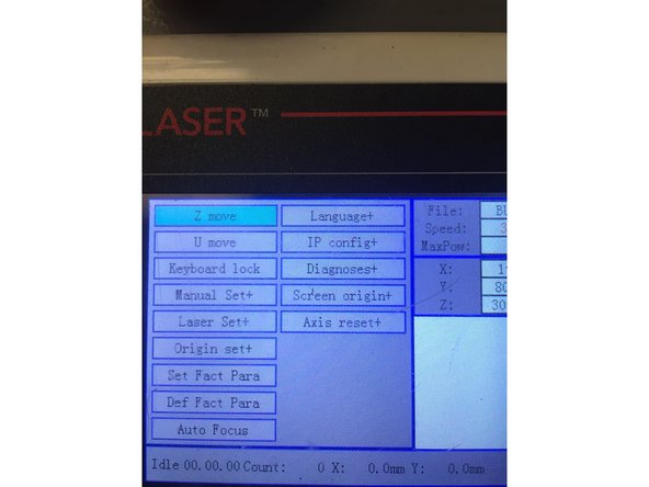 Press the "Z/U" button located on the keypad. With "Z Move" highlighted, use the left arrow on the keypad to lower the laser cut bed to a position where you can safely put your material under the laser.