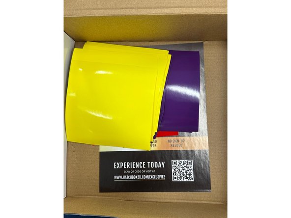 Once you find the box, open it and take the vinyl cut of the color you want. Close the box and place it under the arcade table so that you don't lose it.