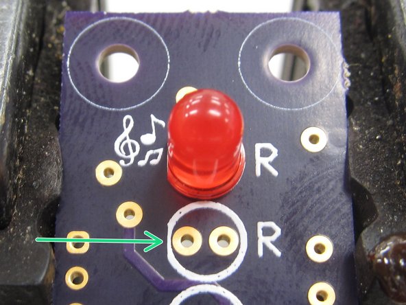 In order to determine how to properly orient the LED, look at the plastic case.  One side will have a small, flat edge.