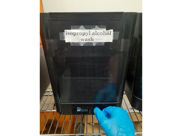 Once the print is complete, the next step is to put on gloves