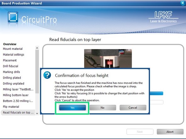 The mill will now search for the fiducial holes around the perimeter of your board.  This process begins by moving the camera into position and focusing it.  When prompted, click Yes to confirm focus height.