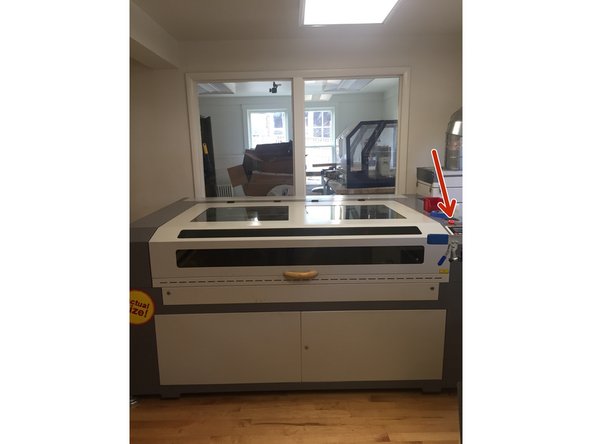 First, turn on the exhaust system on the right side of the laser cutter using the power strip on the floor.