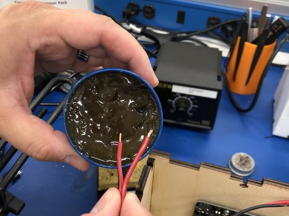 Using the remaining 1' wire, very tightly twist the wire ends.  We are going to pre-tin the wires and leads with solder.