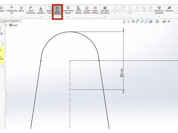 Click the Trim Entities button within the Basic Modeling Tools tab.  Use the mouse scroll wheel to zoom in on the small circle.