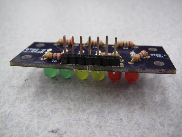 LEDs are all on the top side of the PCB while resistors and header pins are on the back of the PCB.