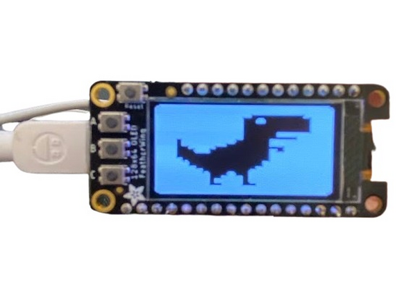 To earn a badge for the display, find an image that you'd like to display. Make sure it's in the .bmp format (online converters may be helpful) and equal to or smaller than 128x64 pixels. Otherwise, it may not fit properly on your screen and look wrong. Save your image as a unique filename in your Feather's root directory.