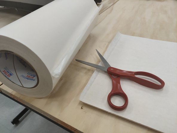 Scissors can be found near the Vinyl Cutter.