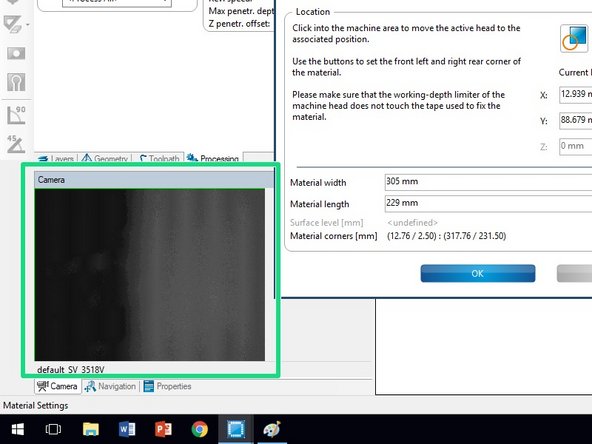 Look at the milling bed within the Machinig view tab.  Left click on the bed where you believe the bottom left corner of the copper clad is located. In this example this will be on the far left edge of the milling bed, slightly below the red line running across the middle.  Notice that the circular cross hairs have moved to where you clicked.