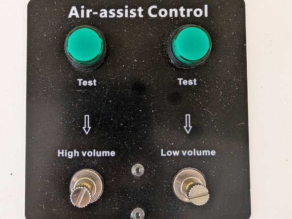 Wait for any smoke to clear and for the fan to shut off.  The two Air-assist control lights on the left side of the laser cutter will go dim when it is safe to open the door.
