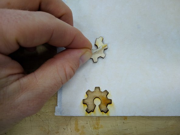 Lift the Glowforge lid and remove your material and your cut part(s).