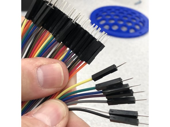 Take seven strands of wire ribbon.  Keep them attached to each other, but separate slightly at the ends.