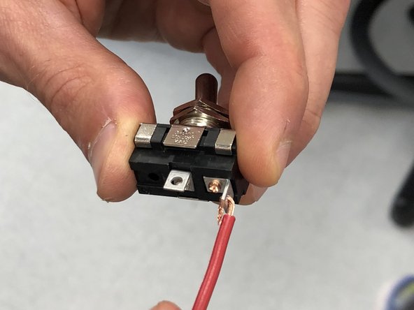 Take the wire that you have just soldered to the barrel jack.