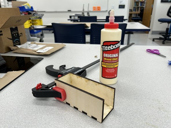 Assemble the box as shown using wood glue (located in the glue drawer in the closet).