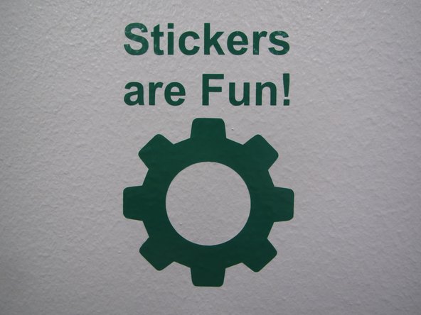 Once you have your tape/sticker removed, place it where you would like it and again go over it with the squeegee.  A credit card will work as well.