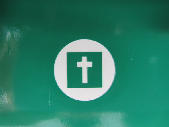 Use tweezers or an X-Acto knife to peel off the outer circle and the inner cross.  Ideally you should be left with a result similar to that shown here.