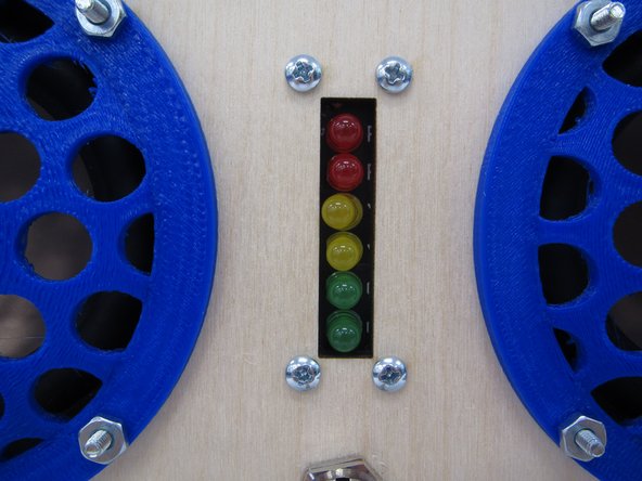 For now, it is sufficient to simply connect your completed VU meter PCB to your enclosure.  Begin by attaching a 7-pin ribbon cable to your PCB header pins.