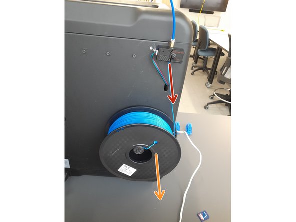Once the automated unloading procedure is finished,  pull out the filament from the PTFE tube until it exits the filament sensor.