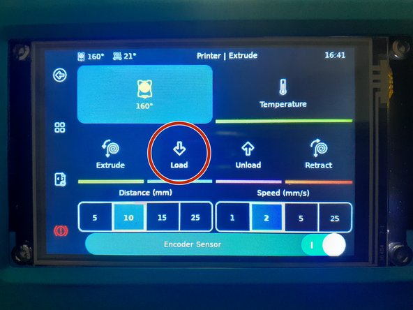 Select &quot;Load&quot; on the touch screen. This again may take some time.