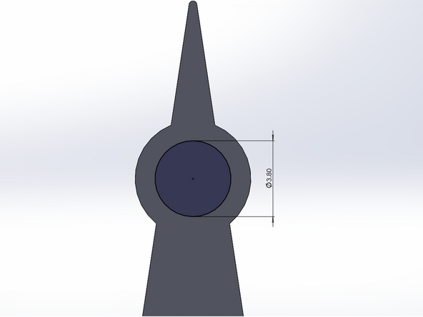 Create a Circle (make sure you choose the face of the arm and not the face of the circular shaft extrusion) and make it concentric with the magnet extrusion you made previously.  Use the Smart Dimension tool to set the diameter of this new circle to 3.8 mm.