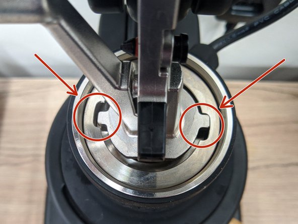 If these slots are instead close to the right and left sides of the brew chamber (shown in the second photo in red) then please STOP and alert a Maker-E technician.  You cannot proceed until this is corrected.