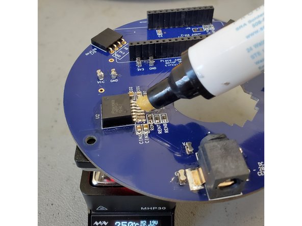 Place your PCB onto the hot plate, making sure it’s as flat as possible and centered under the target component.