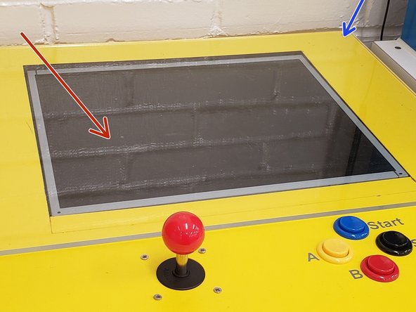 Place the monitor in the laser-cut, rectangular space on the top surface of the table. Screw in the top acrylic plate over the monitor and table.