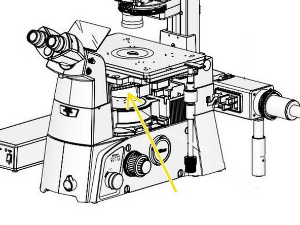 Insert aperture diaphragm by pulling slider as shown in the picture.
