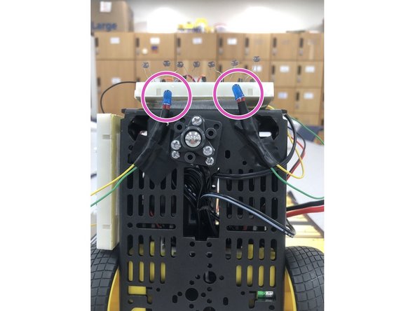 NOTE: Remember that LEDs have polarity, the green wire is the positive side, the yellow wire is the negative side as shown in this diagram.  Be sure to use 150 ohm resistors in series with the LEDs in order to limit the amount of current drawn from the Arduino.