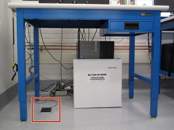 You are now ready to dispense paste.  Locate the foot pedal below the PnP.  You may need to pull it out from under the bench so that it is easily accessible.  You should be standing in order to use the foot pedal while dispensing paste.