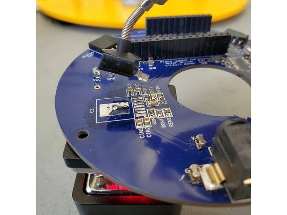 Apply flux to the component around the solder joints.