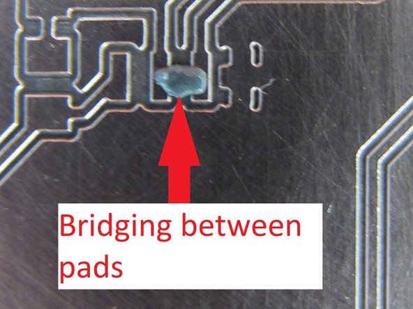If you encounter a large pad, it may be necessary to hold down the pedal longer to dispense a larger amount of paste.  Try to keep the paste from forming a blob on the tip.  Be sure to continue to the move the tip around the pad while dispensing paste in a serpentine fashion.