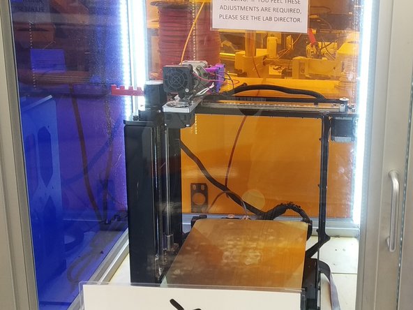 The final step is to place the plastic sheet back on the printer.  Locate each corner of the printer and align the magnet bed to the corner. Gently place the magnetic bed between printer corners.