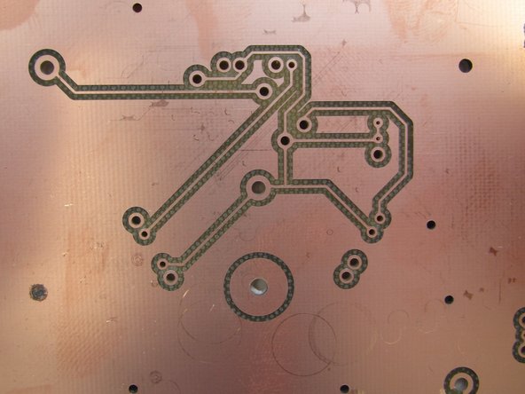 When you see the Flip material screen, it is safe to lift the lid and examine the copper clad to ensure that everything was milled properly.  Pay attention to the following: