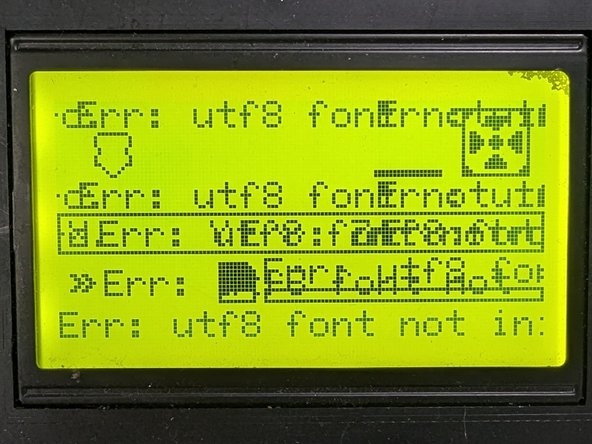 Sometimes the printer screen will display strange characters.  It is safe to ignore these messages and characters.  They will not affect your print.