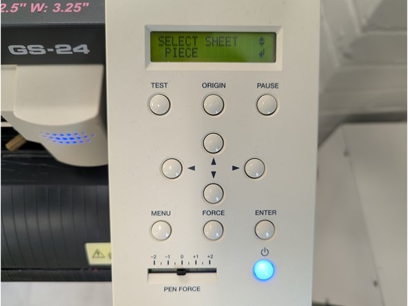 Turn on the vinyl cutter using the blue button.  Press the down arrow until the word PIECE is shown on the vinyl cutter display.  Press ENTER.