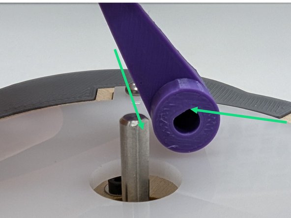 Notice the D shaped profile of the motor shaft as well as the matching D shaped profile in the motor arm you designed.  Orient the arm so that the flat edges of the D profile align.