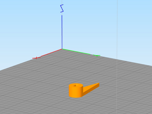 In the example shown here, the object needs to have the broad, flat side (highlighted with red arrow) placed flat on the bed for maximum adhesion to the bed.