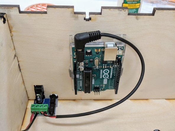 (15)Begin by plugging the barrel plug into the Arduino's barrel jack on the left side.