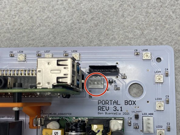 The first image shows the connections between the connector and button.  The lower pins are for the button and the other two pins labeled + and - (in yellow circles) are for the light.