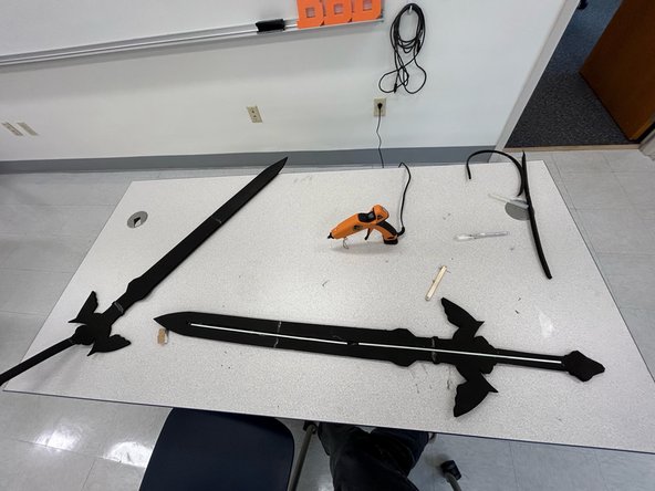 Glue the rod inside the cut-out slot