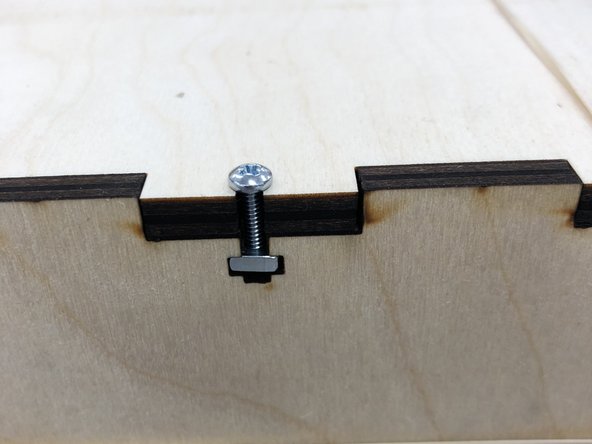 (31) Select eight 4-40 1/2&quot; screws and eight nuts from the supply provided.