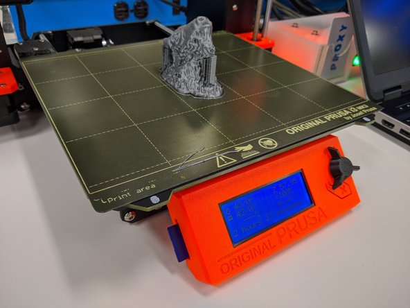 When the print is finished, let it cool for several minutes.  The object could warp if it’s handled before cooling. Also, the bed will cool after several minutes, making it safer to remove your part.