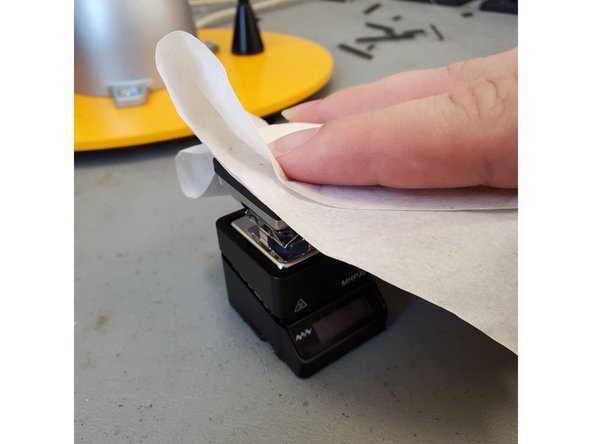 To quit heating, long press B. The light will remain red as long as the surface is hot and will eventually become green again once the device is cool.