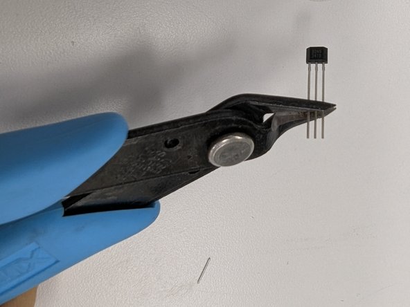 Use a pair of flush cutters to clip the leads.