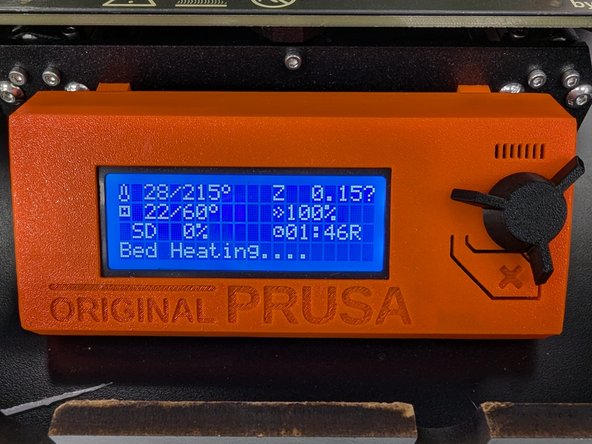 The display should now show some printer stats and the message, &quot;Bed heating...&quot; should appear at the bottom.